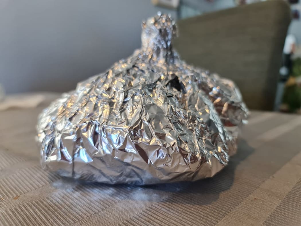 Lu wrapped up in foil, ready for the oven or umu