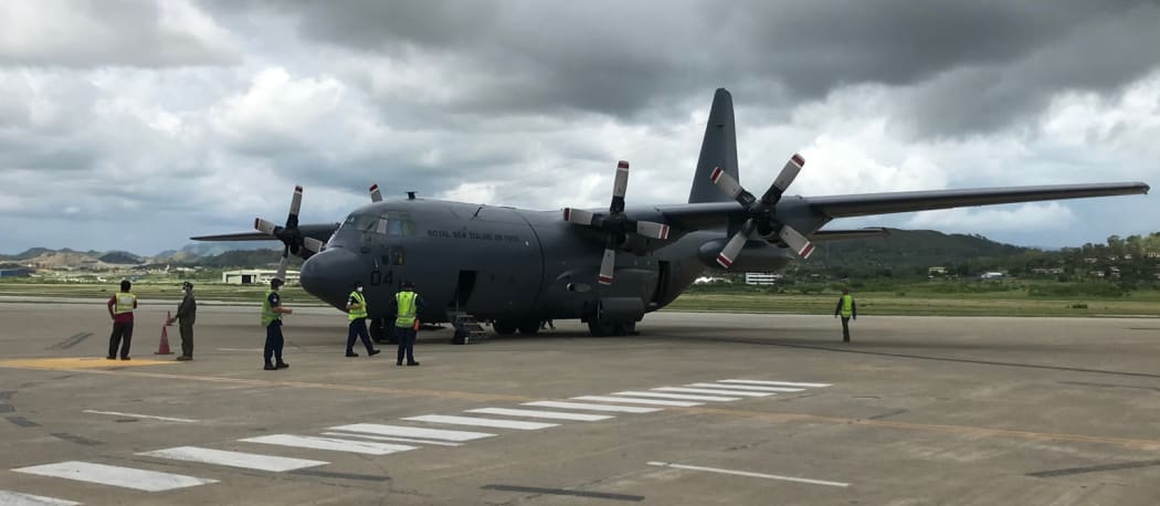 A Royal New Zealand Air Force C-130 Hercules arrives in Port Moresby, 30 November 2021.