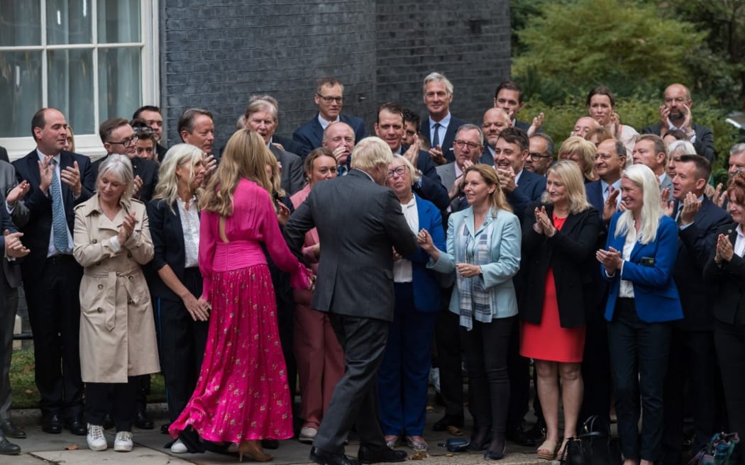 Boris and Carrie Johnson bid goodbye to friends and supporters in Downing Street.