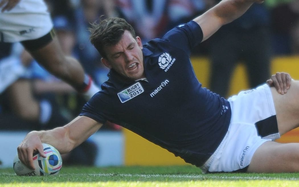 Scotland centre Matt Scott crosses the line for a second half try against the USA at the Rugby World Cup, 2015.