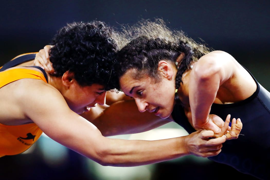 Ana Moceyawa of New Zealand competes against Pooja Dhanda of India at the Women's Freestyle 57 kg Group match. Gold Coast 2018 Commonwealth Games, Wrestling, Gold Coast, Australia. 13 April 2018 © Copyright Photo: Anthony Au-Yeung / www.photosport.nz