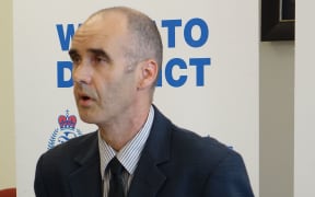Detective Sergeant Nick O'Brien at the police news conference today.