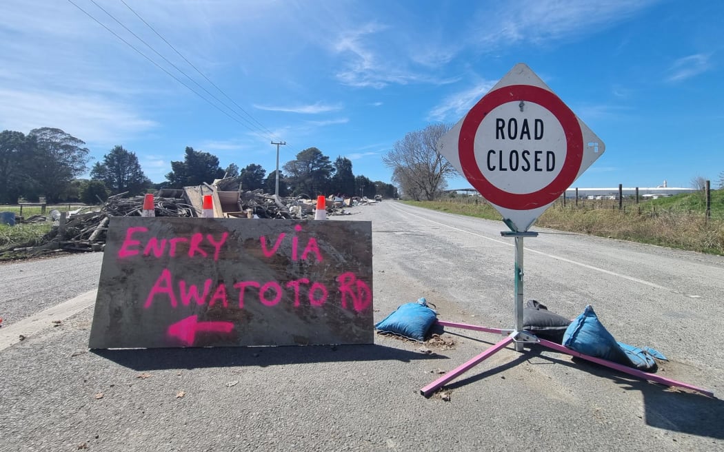 The other route into the industrial zone via Awatoto Road is closed. Residents are volunteers have been bringing trailer load after trailer load of waste and ruined furniture to an informal dump site on the corner of Eriksen and Awatoto roads. They say the local council knows about it and plans to clear it.