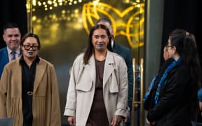 Te Arikinui Kuini Nga wai hono i te po The Queen accompanied by Toitū Te Reo's Te Rina MacLeod.