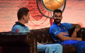 England captain Eoin Morgan and India counterpart Virat Kohli chat prior to the start of the 2019 Cricket World Cup.