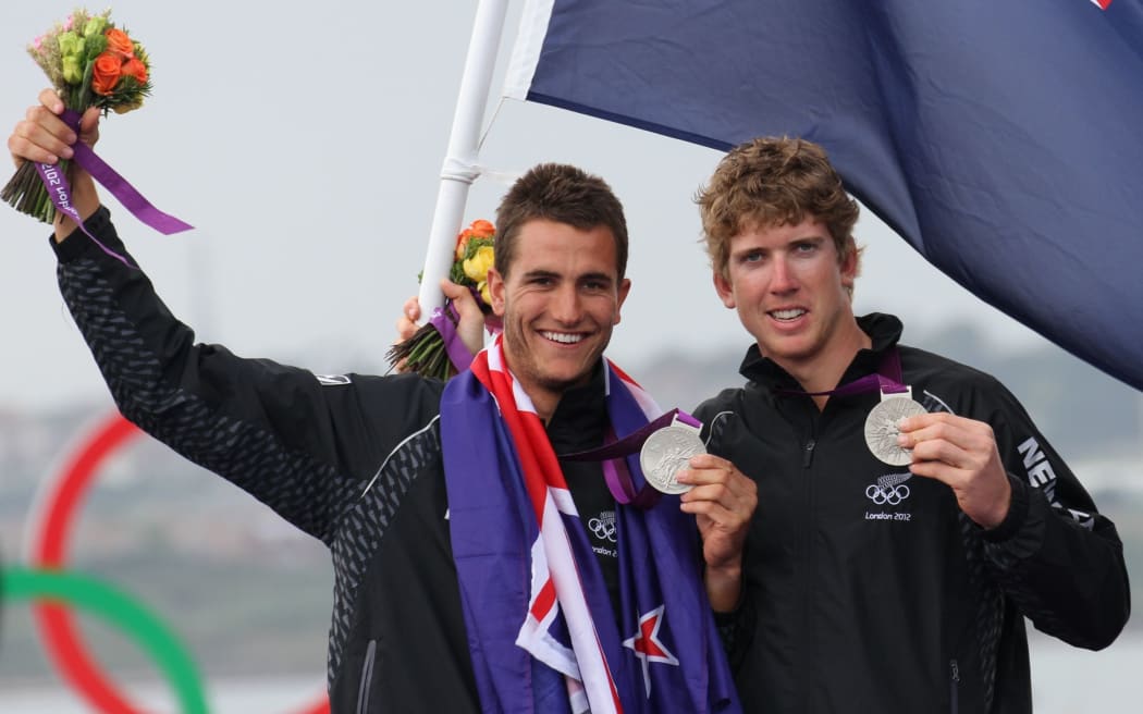 New Zealand sailors Blair Tuke and Peter Burling on the 2012 Olympic medal podium.