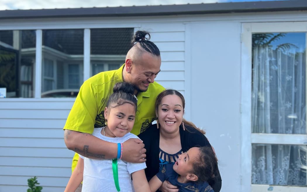 Daniel Filimoni and Anna Filemoni his wife and two children.