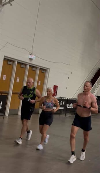 Sophia and Bob Warren on one of the eight running legs of their Hyrox competition.