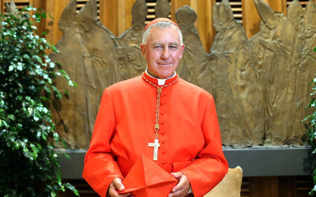 VATICAN CITY, VATICAN - FEBRUARY 14:  Newly appointed cardinal   John Atcherley Dew Archbishop  of Wellington New Zealand poses during the courtesy visits in the Apostolic Palace on February 14, 2015 in Vatican City, Vatican. In addition to 15 new electors, Pope Francis named five new cardinals who are over the age of 80 and, therefore, ineligible to vote in a conclave.  (Photo by Franco Origlia/Getty Images)