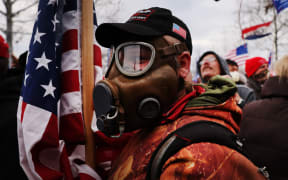 WASHINGTON, DC - JANUARY 06: Thousands of Donald Trump supporters storm the United States Capitol building following a "Stop the Steal" rally on January 06, 2021 in Washington, DC.