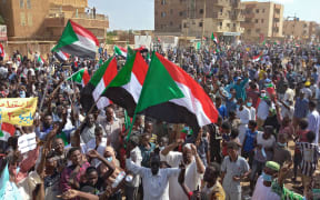 Thousands of protesters demonstrate against the coup in Omdurman city, on Saturday.