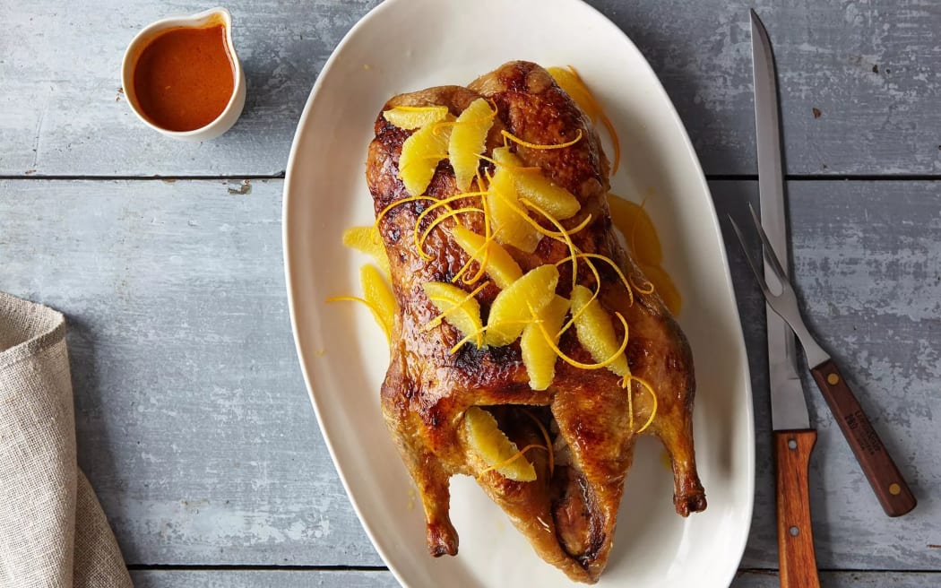 Duck a l'Orange on a white plate