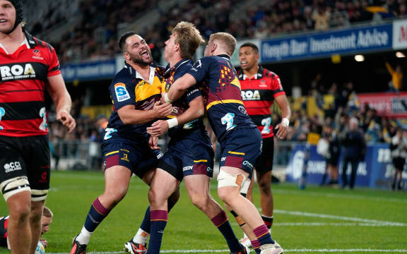 Cam Milllar celebrates his try against the Crusaders in round 12 of the Super Rugby Pacific competition at Forsyth Barr Stadium.