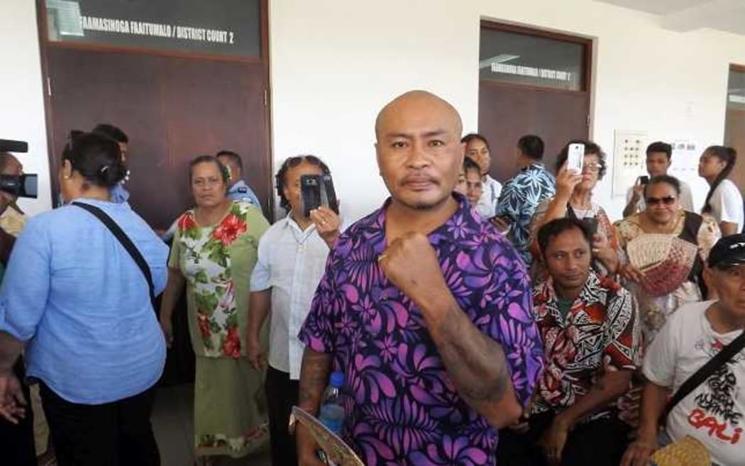 Talalelei Pauga and supporters outside court in Apia