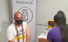 Aupito William Sio gets vaccination