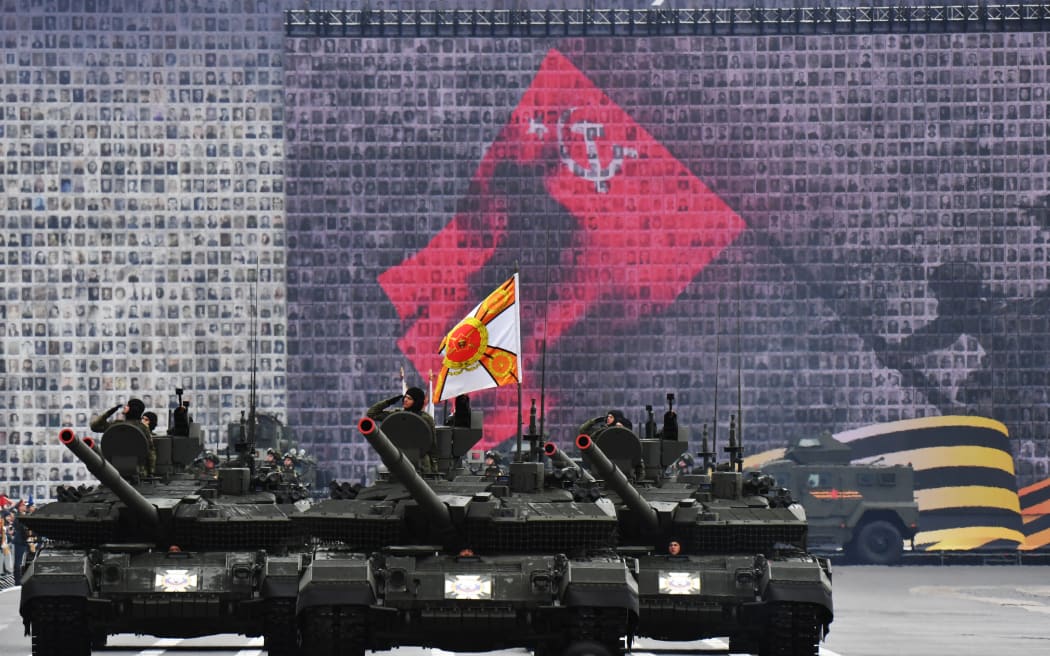Russian military vehicles move on Dvortsovaya Square during the general rehearsal of the Victory Day military parade in central Saint Petersburg on May 7, 2025. Russia will celebrate the 80th anniversary of the Soviet Union's victory over Nazi Germany in World War Two (WWII) on May 9. (Photo by Olga MALTSEVA / AFP)