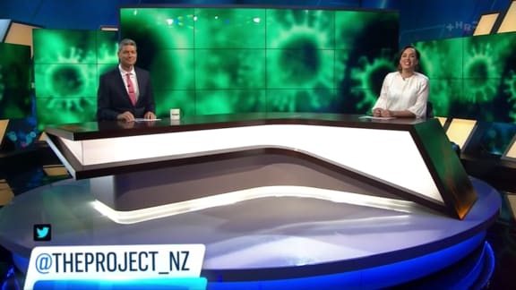 Sign of the times: physically-distanced hosts on Three's 'The Project' - with COVID backdrop.