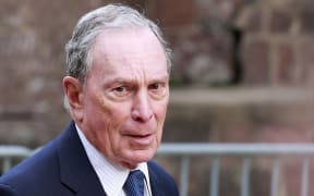 (FILES) In this file photo taken on May 15, 2019 Michael Bloomberg arrives to the opening celebration of the Statue of Liberty Museum on Liberty Island at the Statue Cruises Terminal in Battery Park in New York.
