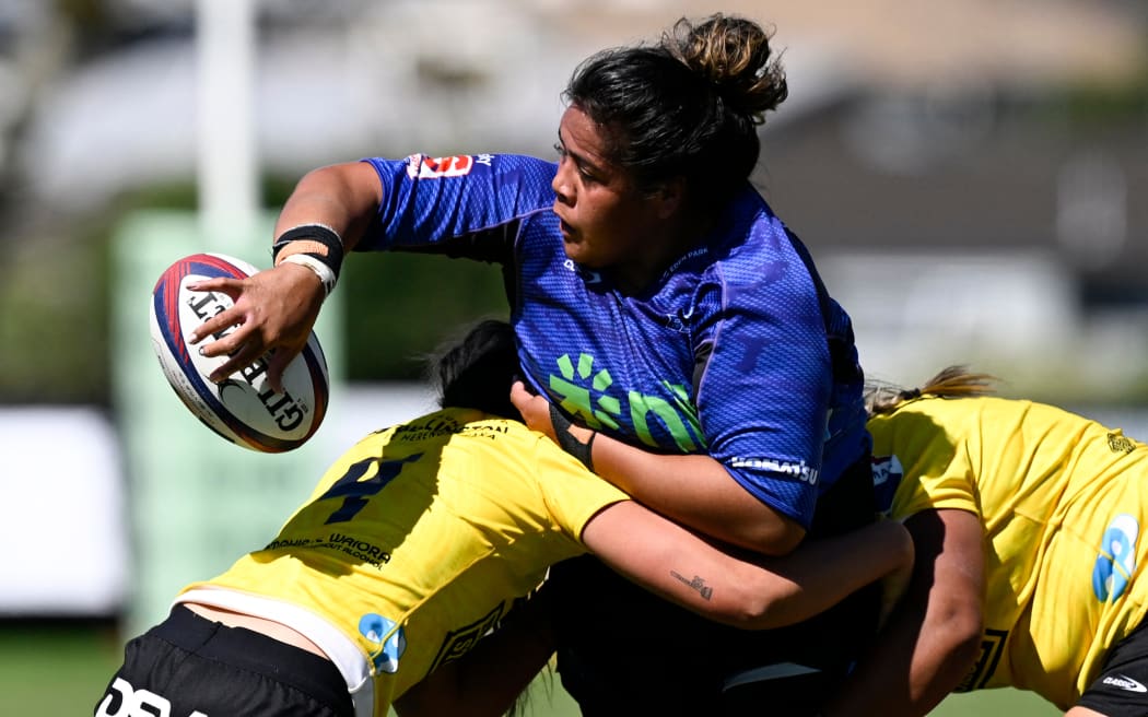 Aldora Itunu in action for the Blues against Hurricanes Poua,