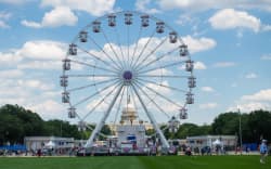 People attend the opening day of the “Great American State Fair” on the National Mall in Washington, DC, June 25, 2026. The “Great American State Fair” will be held from June 25 to July 10, 2026, to celebrate the 250th anniversary of US independence. (Photo by Matthew Hatcher / AFP)