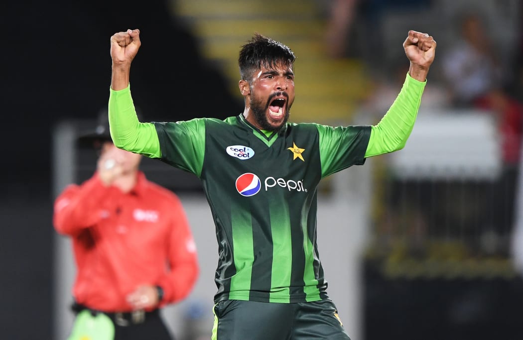 Pakistan's Mohammad Amir celebrates during the second T20 match against the Black Caps after claiming the wicket of Colin Munro.