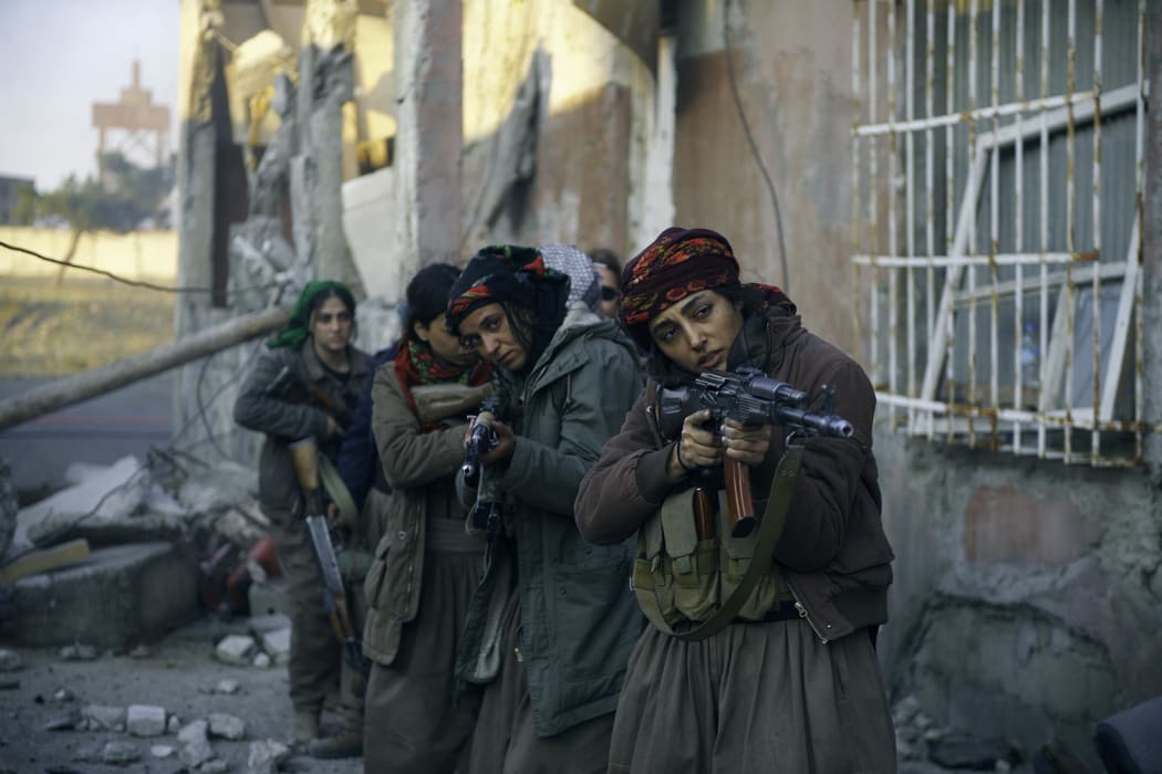Kurdish women freedom fighters (led by Golshifteh Farahani) in Girls of the Sun.