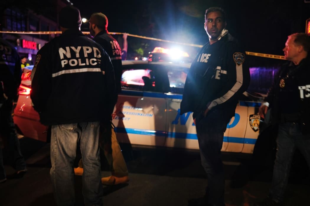 NEW YORK, NEW YORK - JUNE 03: Police gather at the scene where two New York City police officers were shot in a confrontation late Wednesday evening in Brooklyn on June 03, 2020 in New York City.