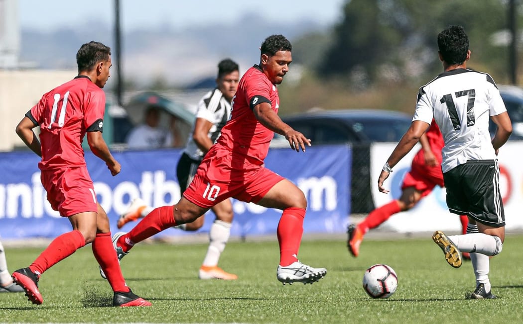 Veitongo FC's Hemaloto Polovili makes a run.