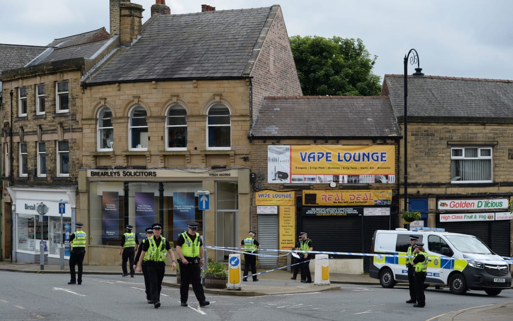 Police at the scene where British MP Jo Cox was shot and killed.