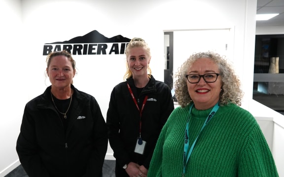 Barrier Air crew members, from left, Susan Wintraecken and Antonia Cathcart, and general manager Karen Pascoe.
