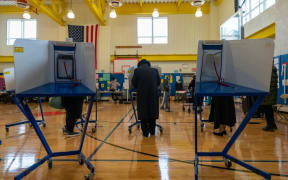 NEW YORK, NY - NOVEMBER 03: A voter fills out their ballot at Public School 160on November 3, 2020 in the Brooklyn borough of New York City.