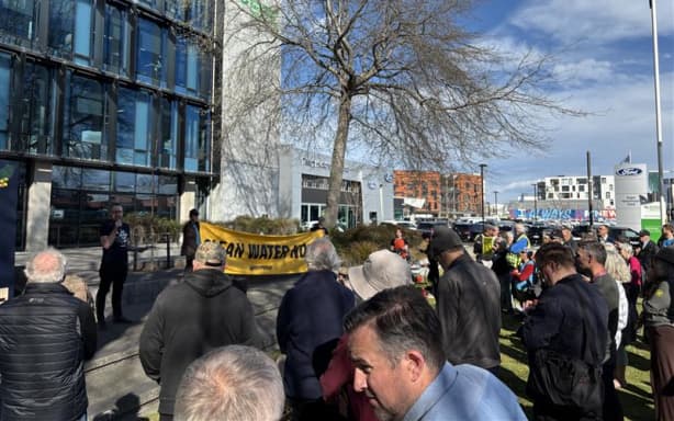 Protesters outside the Canterbury Regional Council offices demand action on nitrate levels.