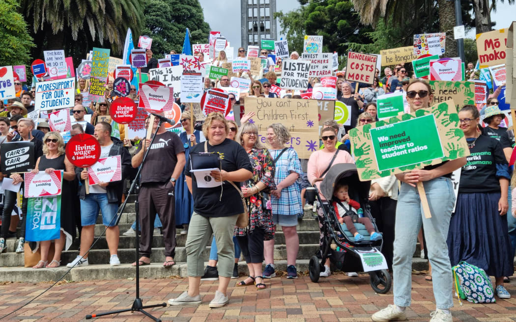 Striking teachers on church steps in Nelson