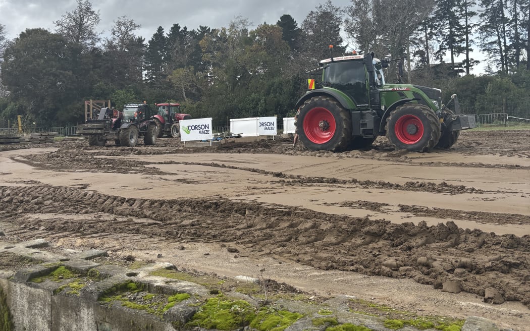 Tractors pulling concrete blocks
