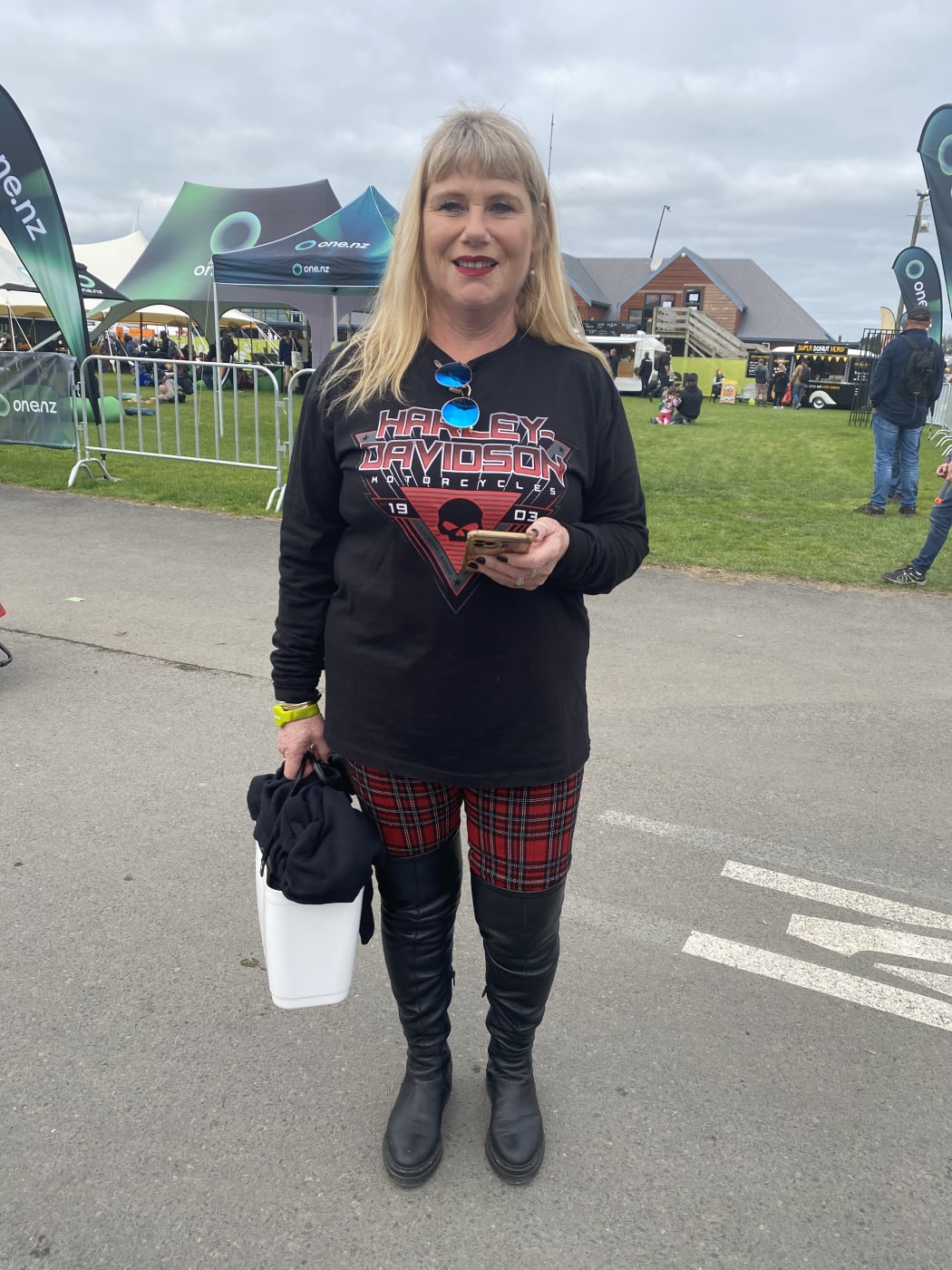 Janice is wearing Mi Piaci boots as gum boots are cold. Tartan tights because they are comfy and lots of travel is involved. She comes here at least every couple of years to see innovation such distilleries and machinery.