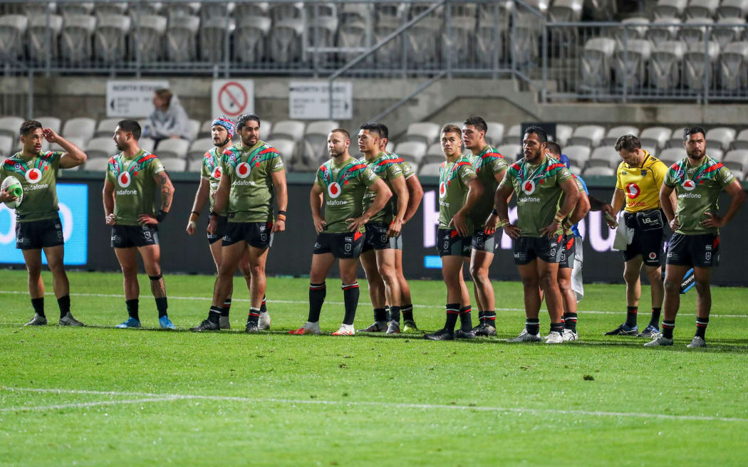 The Warriors looking dejected on their own goal line after a Storm try.