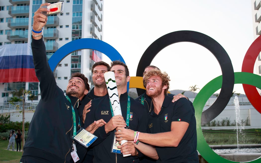 Italian athletes pose at the 2016 Rio Olympics.