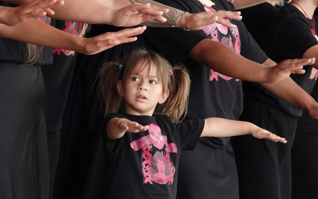 Four-year-old Te Marino Pickering keeps up with the moves during a performance by Ngāti Kawa, Ngāti Rahiri, Te Matarahurahu kapa haka.