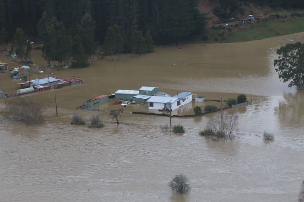 Flooded houses in a rural area near Henley, on the Taieri Plain, after the July winter storm on 20-22 July 2017.