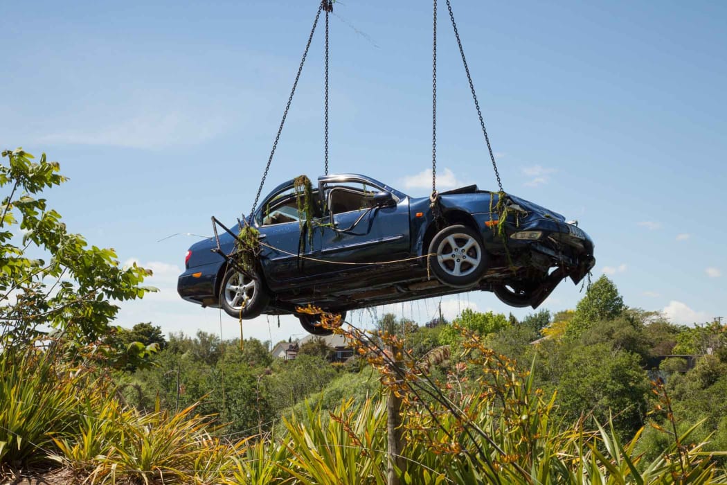 The car has been removed from the river for testing.