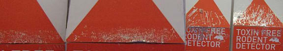 Mice tooth marks on a detector card (left) are very small and tidy, whereas possum teeth marks are very long.
