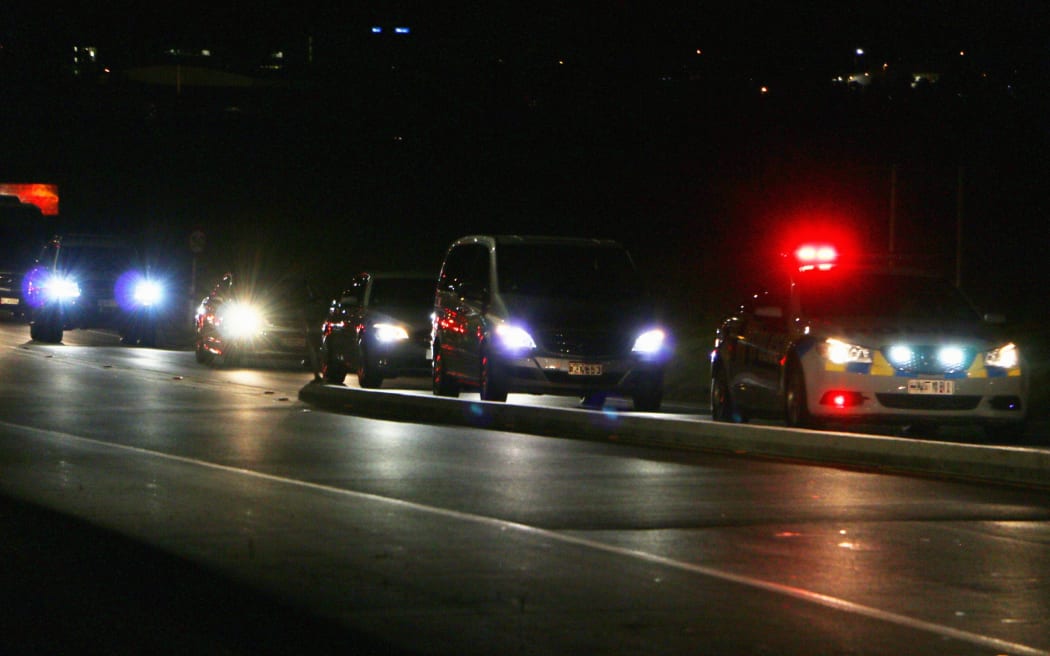 The motorcade for former US president Barack Obama quickly took him away, attended by police,after his flight landed in Auckland.