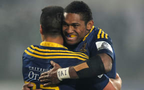 Waisake Naholo and Jason Emery of the Highlanders celebrate after defeating the Chiefs.
