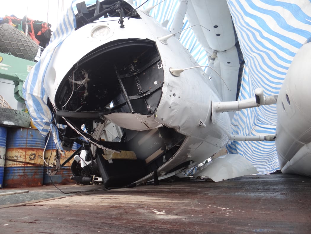 The damaged helicopter cockpit on board the fishing vessel Jih Yu 868 in Majuro a few days after the crash in Nauru waters that killed two.