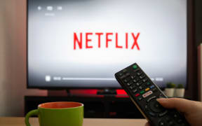 TV Television with Netflix logo in background.