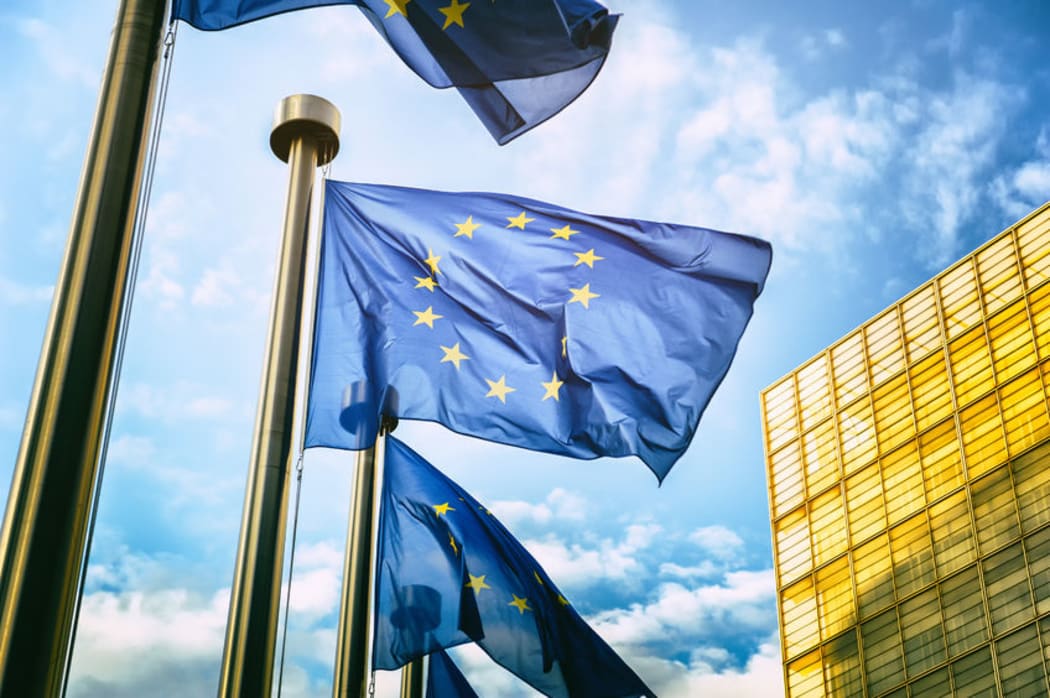 Flags outside the European Commission headquarters in Brussels