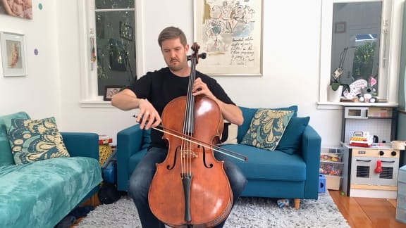 NZSO Cellist Andrew Joyce performing at home on 25 March.