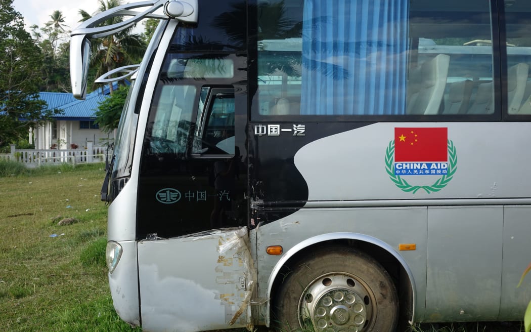 A bus donated through China's aid programme sits in Vanuatu's capital, Port Vila.