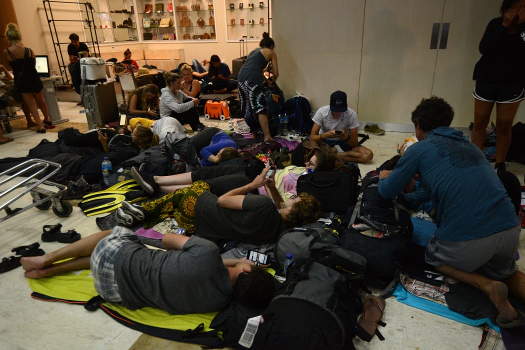 Indonesia sent rescuers fanning out across the holiday island of Lombok and evacuated more than 2000 tourists.