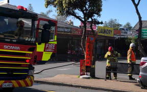 Fire crews arrived at the building in Orewa to find the roof on fire.